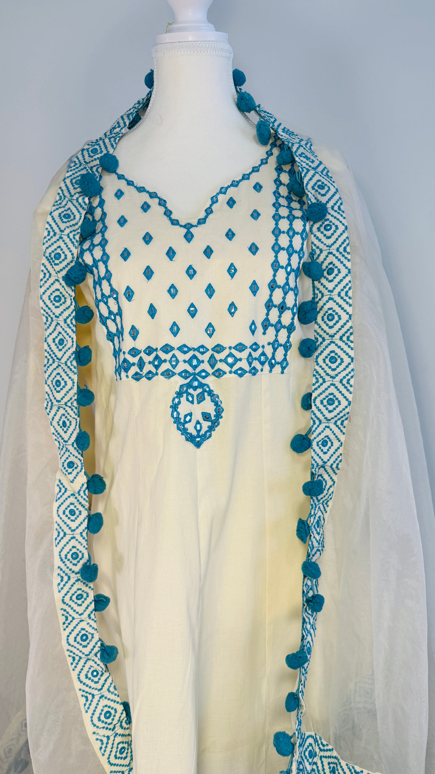 Off-White Cotton Kurti with Blue Mirror Work Embroidery & Pom Pom Dupatta