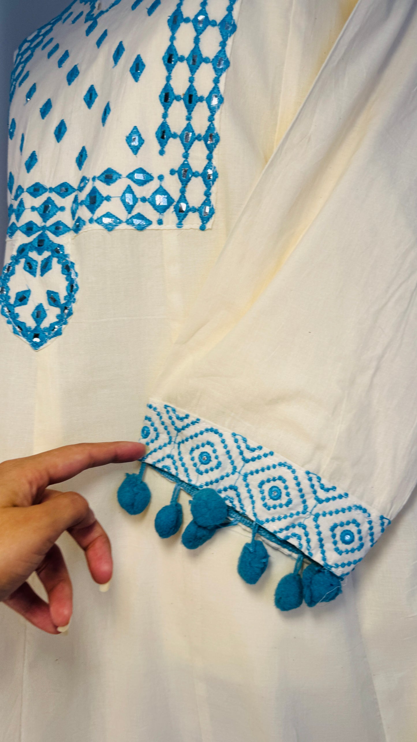 Off-White Cotton Kurti with Blue Mirror Work Embroidery & Pom Pom Dupatta